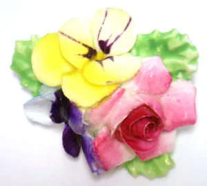 A piece of porcelain floral bouquet brooch